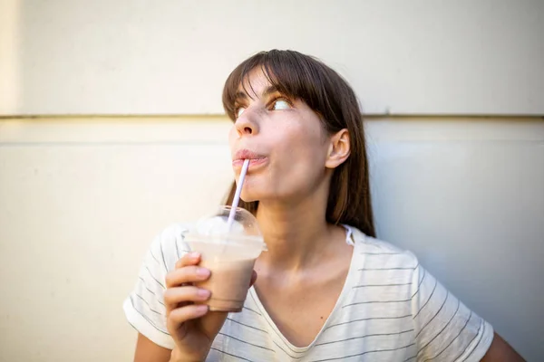 Close Portrait Young Woman Long Hair Drinking Drink Looking Away — Stock Photo, Image