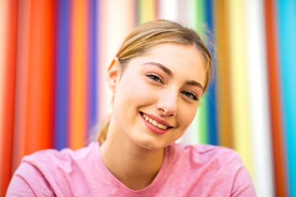 Close Portrait Smiling Teen Girl Blond Hair Colorful Background — Stock fotografie