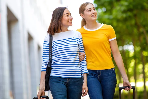 Portrait Smiling Mother Daughter Walking Outdoors Bags — Stockfoto