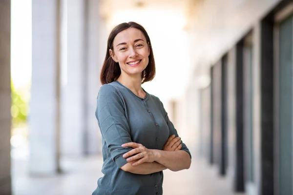 Portrait Attractive Older Woman Smiling Arms Crossed — Stockfoto