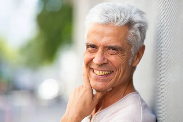 Close Portrait Handsome Older Man Smiling Hand Chin — Stock Photo, Image