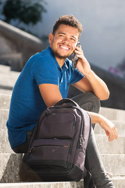 Portrait Smiling Young African American Man Sitting Steps Talking Cellphone — Stock Photo, Image