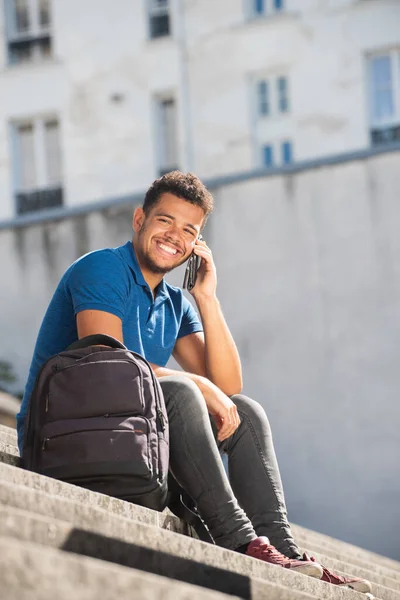 Portrait Happy Mixed Race Man Sitting Steps Talking Mobile Phone — Stock Photo, Image