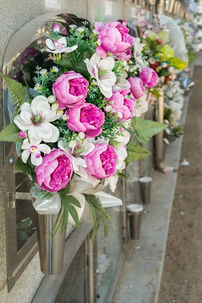 Detail of a bouquet of flowers in a cemetery