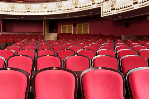 theater hall for visitors with beautiful chairs of Burgundy-red velvet chairs before the show