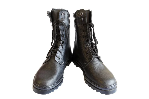 Stivali dell'esercito nero su sfondo bianco. Calzature speciali. Isolato. Un paio di stivali militari. Nessuna gente. . — Foto Stock