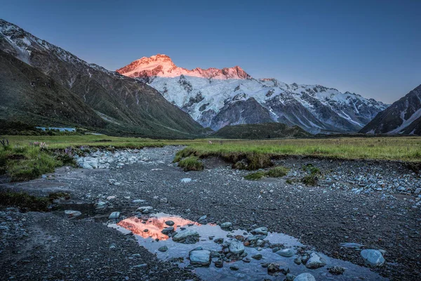 Mount Cook reflected in a stream at dawn, Mount Cook, South Island, New Zealand