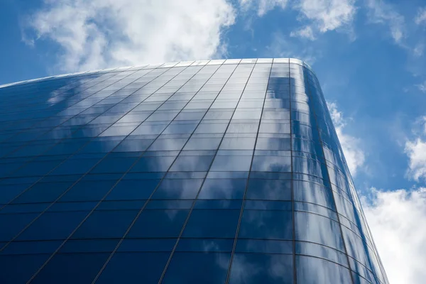 Abstract View London Office Building Reflecting Clouds Passing Overhead Royalty Free Stock Photos