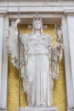 Rome Italy June 29th 2015 : Statue of the Goddess Roma above the flame for the unknown soldier at the Vittorio Emanuele Monument, affectionately known by the locals as 'the typewriter'