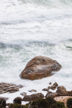 Uzun pozlama kayalar ve dalgalar küçük Oberon defne Wilsons Promontory Milli Park, Avustralya