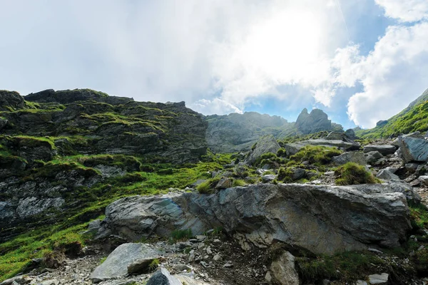 hiking uphill rocky slopes of fagaras mountains