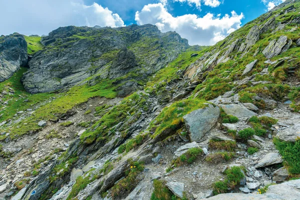 hiking uphill rocky slopes of fagaras mountains