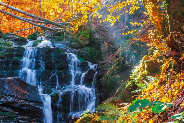 beautiful autumn scenery near the waterfall shypot