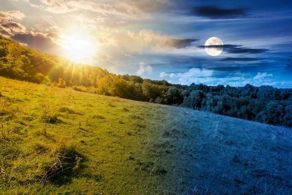 Sonbahar ekinoksu sırasında Karpatya dağlarının kırsal kesimindeki tepede bir orman. Gündüz ve gece zaman kavramını değiştirir. Eylül 'de alacakaranlıkta güneş ve ayın olduğu kırsal bölgenin harika manzarası.