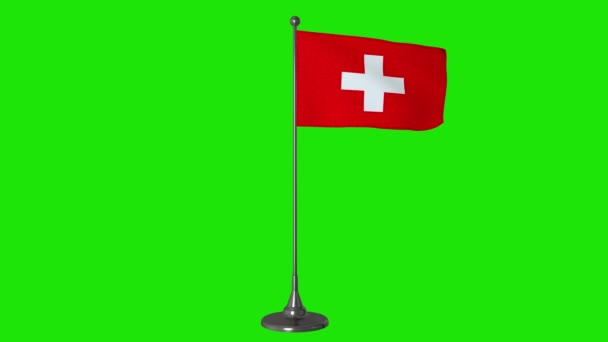 Die kleine Schweizer Flagge flattert an einem Fahnenmast. Grüner Bildschirm Hintergrund, 4K — Stockvideo