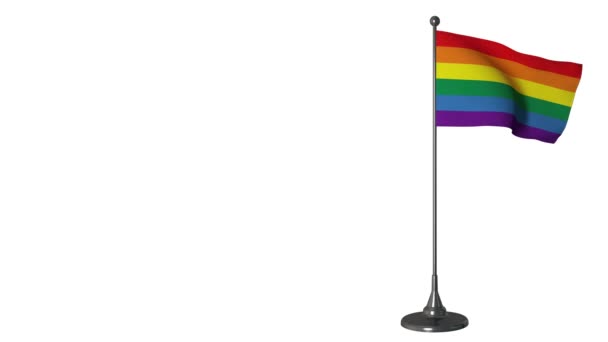 Regnbåge liten flagga fladdrar på en flaggstång. Vit skärm bakgrund, alfa-kanal 4K — Stockvideo
