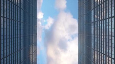 Uçak ofis gökdelenlerinin üzerinde güzel mavi bulutların üzerinde uçuyor, 4K