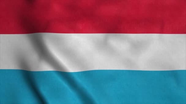 La bandera nacional de Luxemburgo ondea con el viento. 4K — Vídeos de Stock