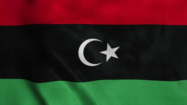 Líbia nemzeti zászlaja a szélben van. 3D-s renderelés — Stock Fotó