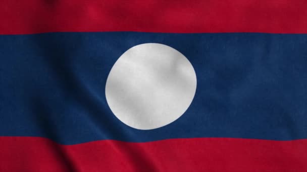 Bandera de Laos ondeando en el viento. Bandera Nacional de Laos. Signo de nacionalidad Laos — Vídeo de stock