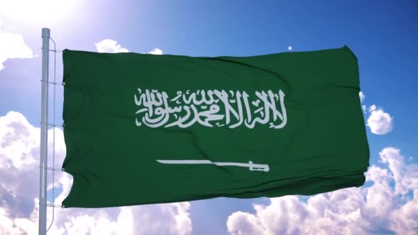 Saúdskoarabská vlajka vlající ve větru proti tmavomodré obloze. 4K — Stock video
