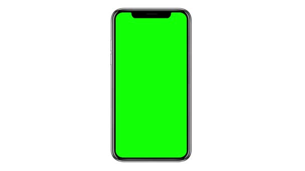 Мобильный телефон с чистым зеленым экраном изолирован на белом фоне. 4K — стоковое видео