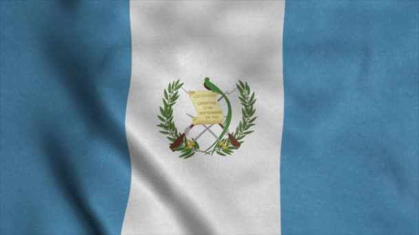 Guatemala zwaaiende vlag met doek textuur. 4K — Stockvideo