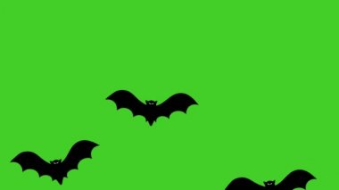Cadılar Bayramı siyah uçan yarasalar yeşil arka planda animasyon