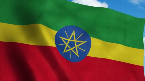Etiopien flagga viftande i vinden, blå himmel bakgrund. 4K — Stockvideo