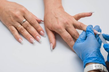 Manikür, ana eğe talaşı çivi bir tırnak törpüsü ile