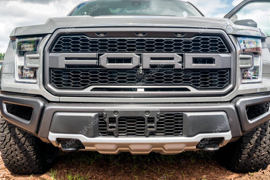 ST. PAUL, MN/USA - AUGUST 29,2018: Ford logo and grille. Ford Motor Company is an American automobile manufacturer.