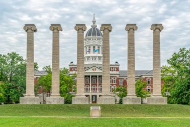 COLUMBIA, MO/USA - JUNE 9 , 2018: Lonic columns and Jess Hall at the University of Missouri. clipart