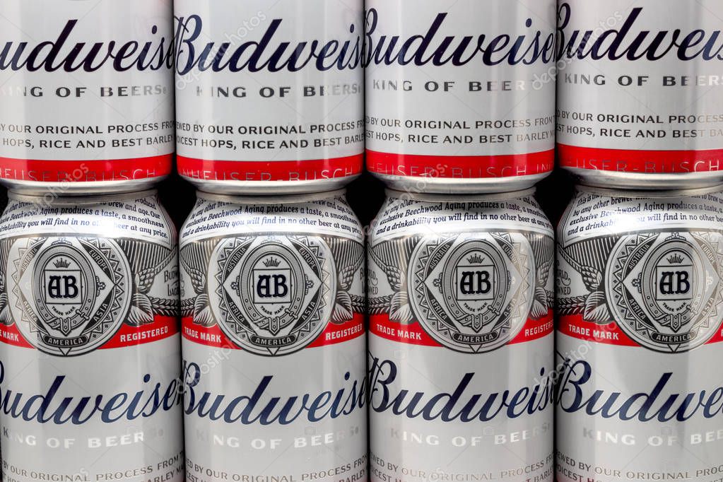 ST. PAUL, MN/USA - FEBRUARY 16, 2019: Grouping of Budweiser beer and trademark logo. Budweiser is an American-style pale lager produced by Anheuser-Busch.