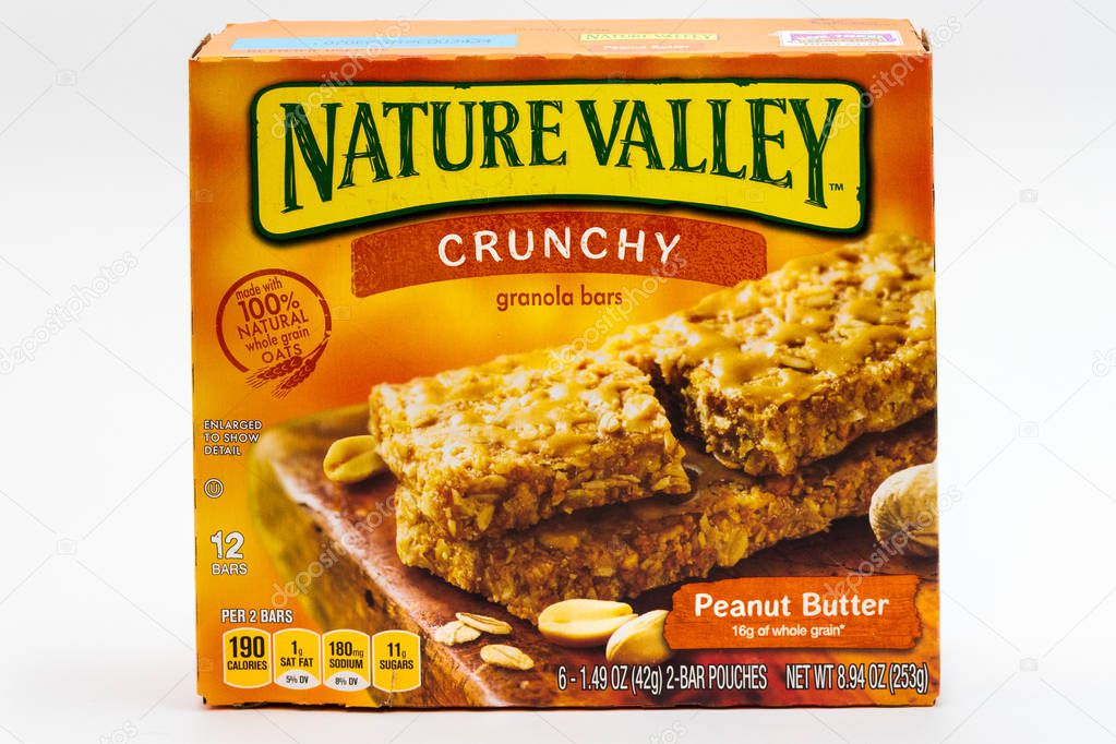 ST. PAUL, MN/USA - FEBRUARY 24, 2019: Nature Valley peanut butter granola bar container and trademark logo. Nature Valley is a brand of granola bars by General Mills.