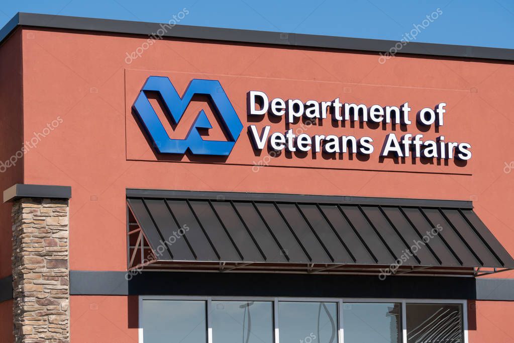 GRAND FORKS, ND/USA - JUNE 28, 2019: United States Department of Veterans Affairs outpatient clinic exterior and trademark VA logo.