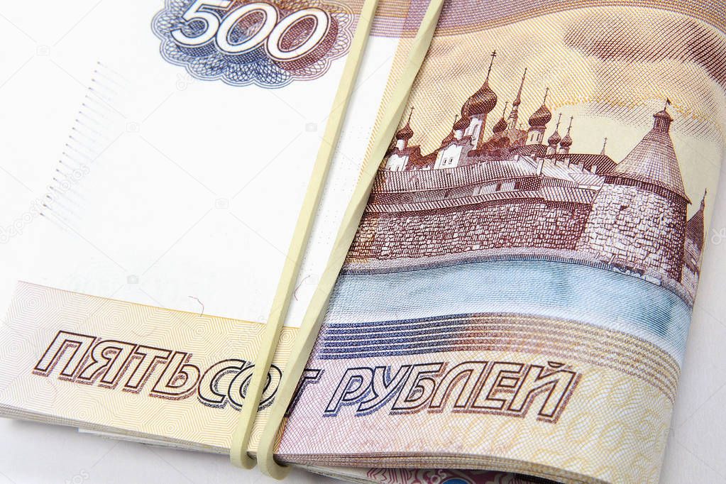 A pack of bills 500 rubles, tied with an elastic band