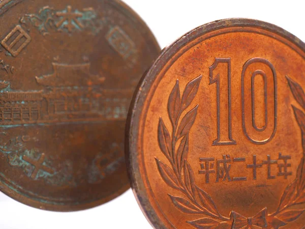 Японські Монети Десять Ієн Стоять Перед Білим Фоном Фрагменти Крупним — стокове фото