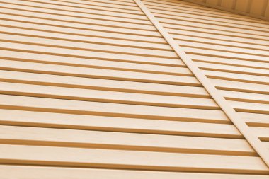 Çizgili plastik kaplama yüzeyi ve korniş parçası. İnşaat ve binaların tadilatı. Açık kahverengi arkaplan ya da duvar kağıdı. İnşaat malzemeleri veya teknolojileri