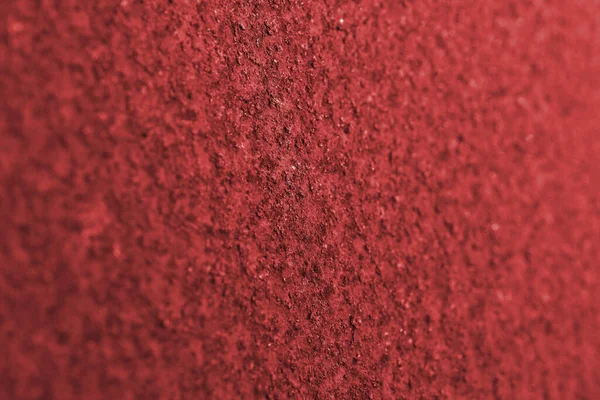 어두운 붉은색의 가로수 배경이나 벽지입니다 딱딱하고 울퉁불퉁 황로에 가까운 색이다 — 스톡 사진