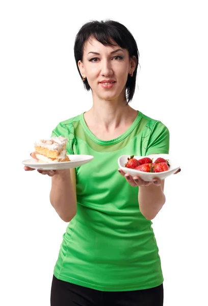 Mädchen Wahl Zwischen Erdbeere Und Süßem Kuchen Isoliert Auf Weißem — Stockfoto