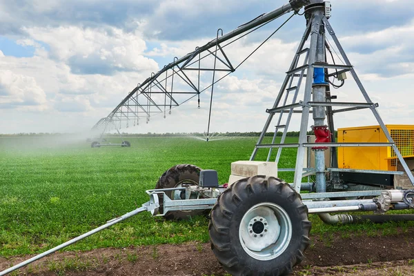 Irrigation Machine Watering Agricultural Field Young Sprouts Green Plants Black — Stock Photo, Image