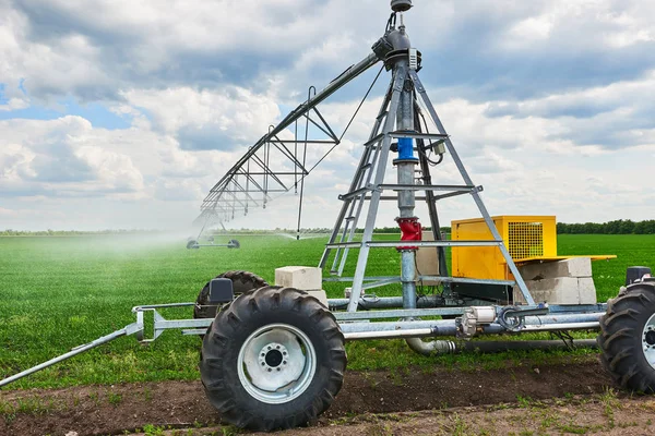 Irrigation Machine Watering Agricultural Field Young Sprouts Green Plants Black — Stock Photo, Image