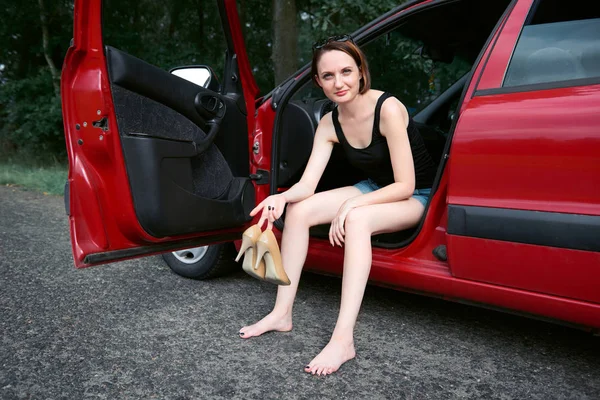 Young Woman Driver Resting Red Car Take Shoes Happy Travel — Stock Photo, Image