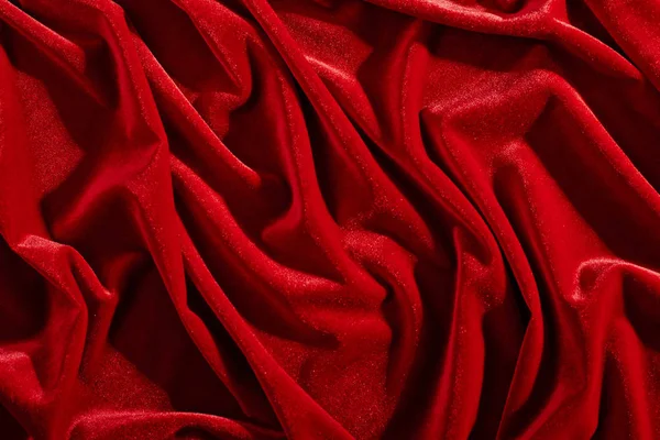 背景やテクスチャ しわの影に赤い色のベルベットの織物 — ストック写真