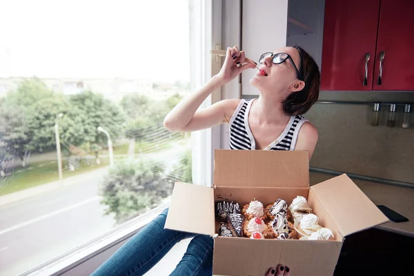 Girl Eating Tasty Cakes Sitting Window Sweet Food Pleasure — Stock Photo, Image