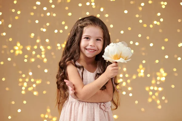 Girl Child Christmas Lights Yellow Background Pink Dress — Stock Photo, Image