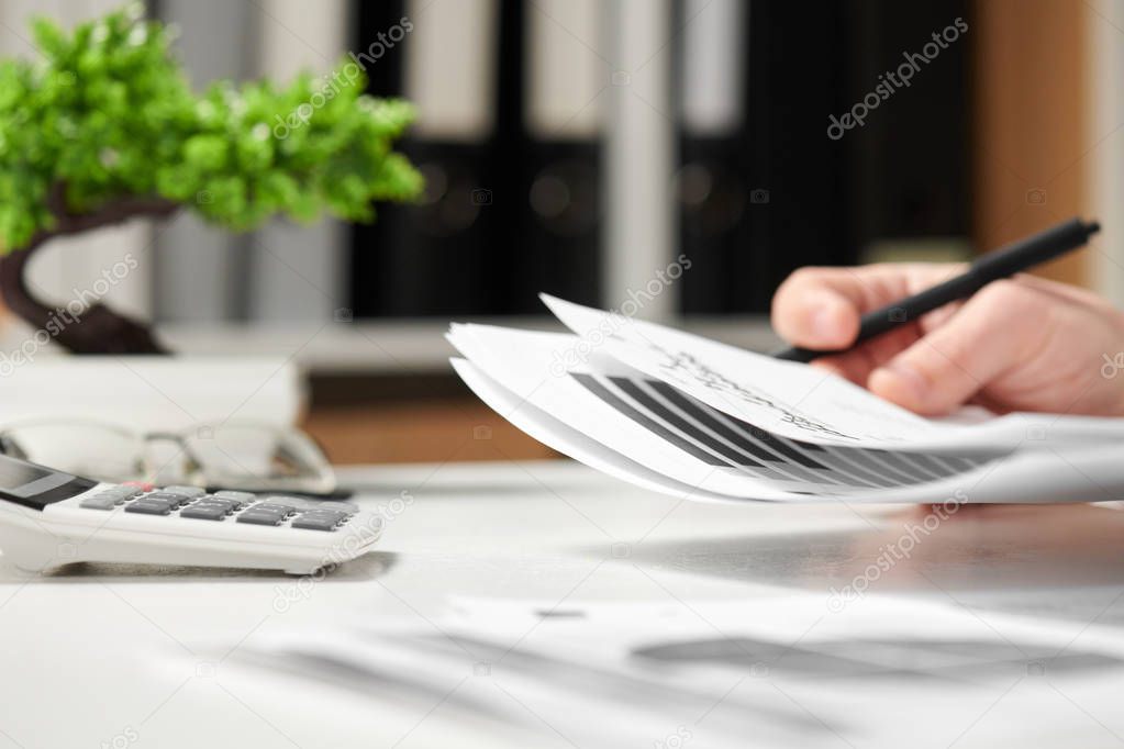 Businessman working in office and calculating finance. Business financial accounting concept.