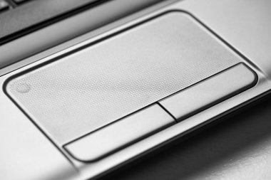 Dizüstü touchpad ve düğmeler, makro fotoğraf.