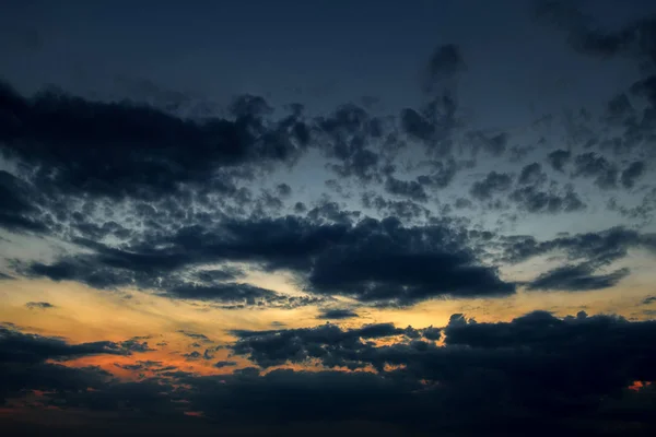 Dark sky with clouds at sunset — Stock Photo, Image