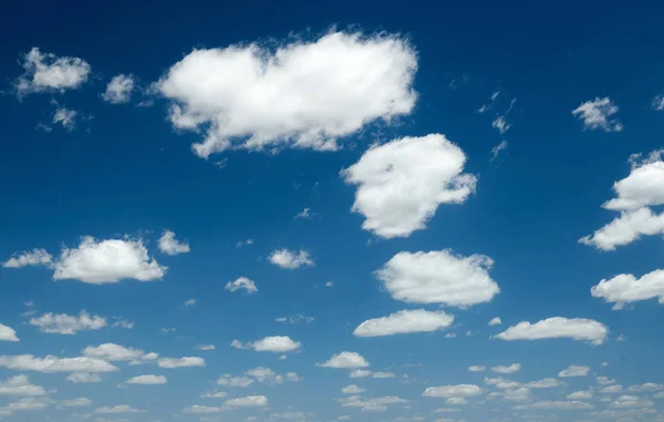 Bright beautiful blue sky with clouds for background or texture — Stock Photo, Image